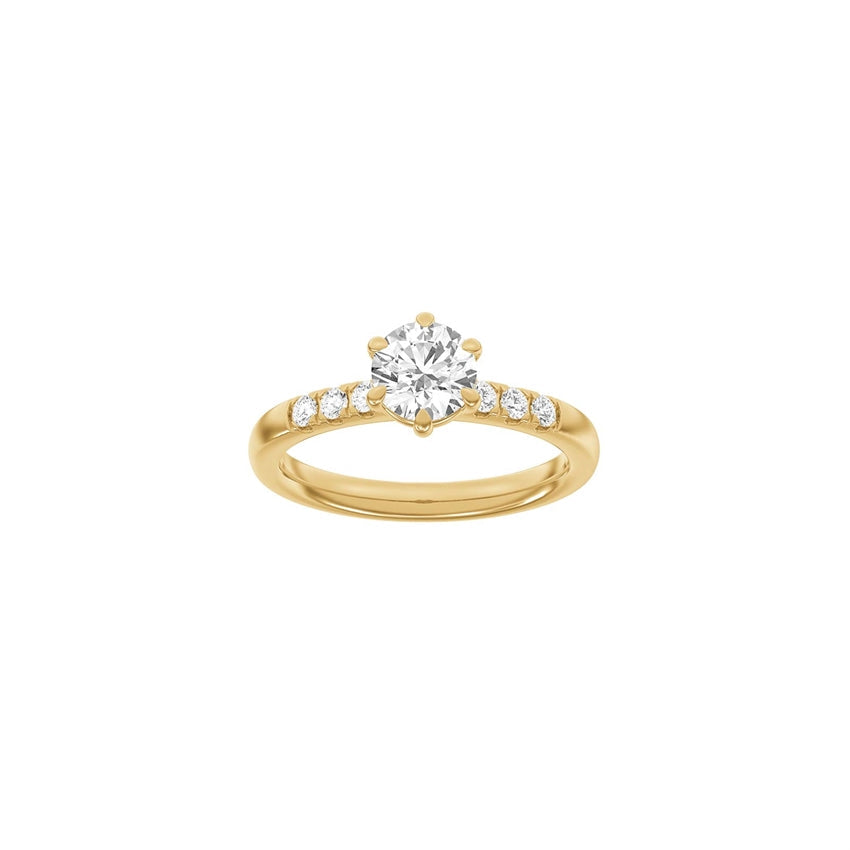 Siersbøl luxury rund ring i 14 karat guld med lab-grown diamanter 1,2 ct – elegant forlovelsesring med rund, klar diamant og mindre sten i guld.