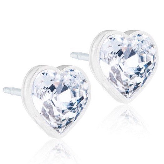 Blomdahl Heart Crystal øreringe i medicinsk plastik med klart hjerteformet zirkonia, 6 mm.