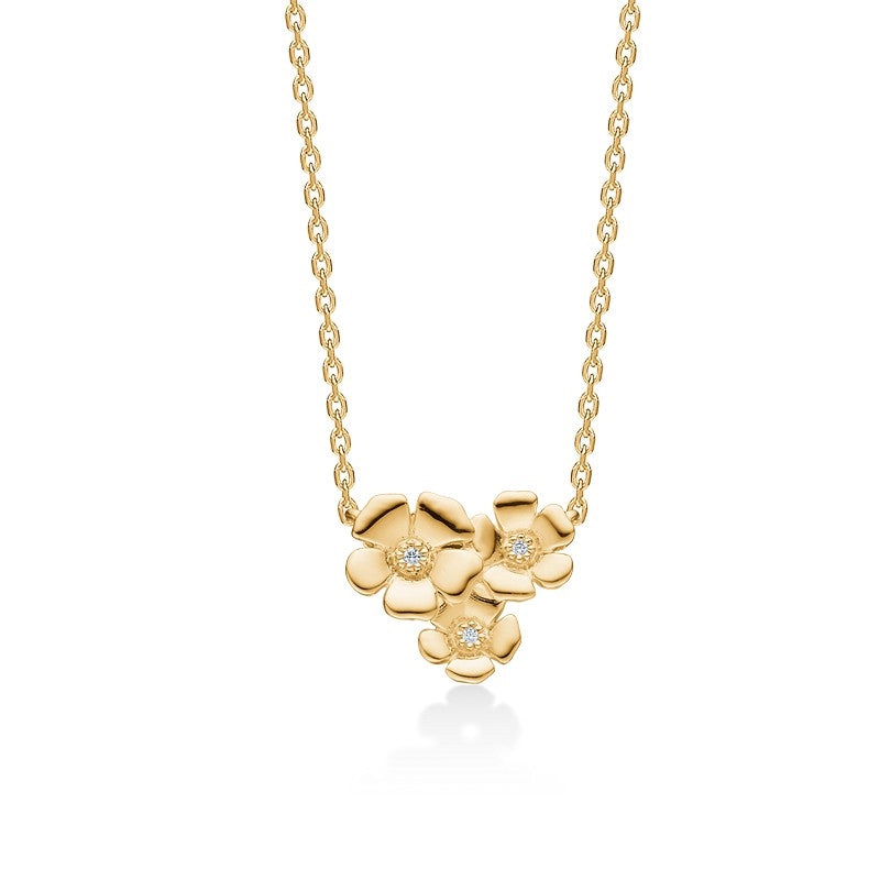 Fleur halskæde i 14 kt guld med diamanter og floralt vedhæng fra Mads Z (40–45 cm).