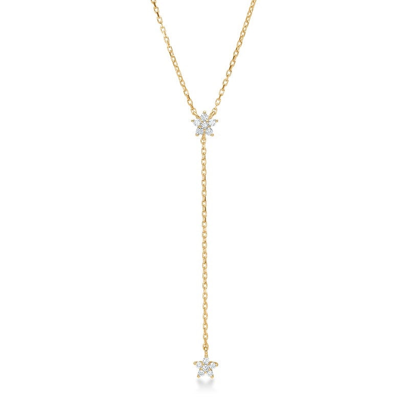 Céleste halskæde fra Mads Z i 14 karat guld med 0,12 ct diamanter og stjernemotiv i Y-form.