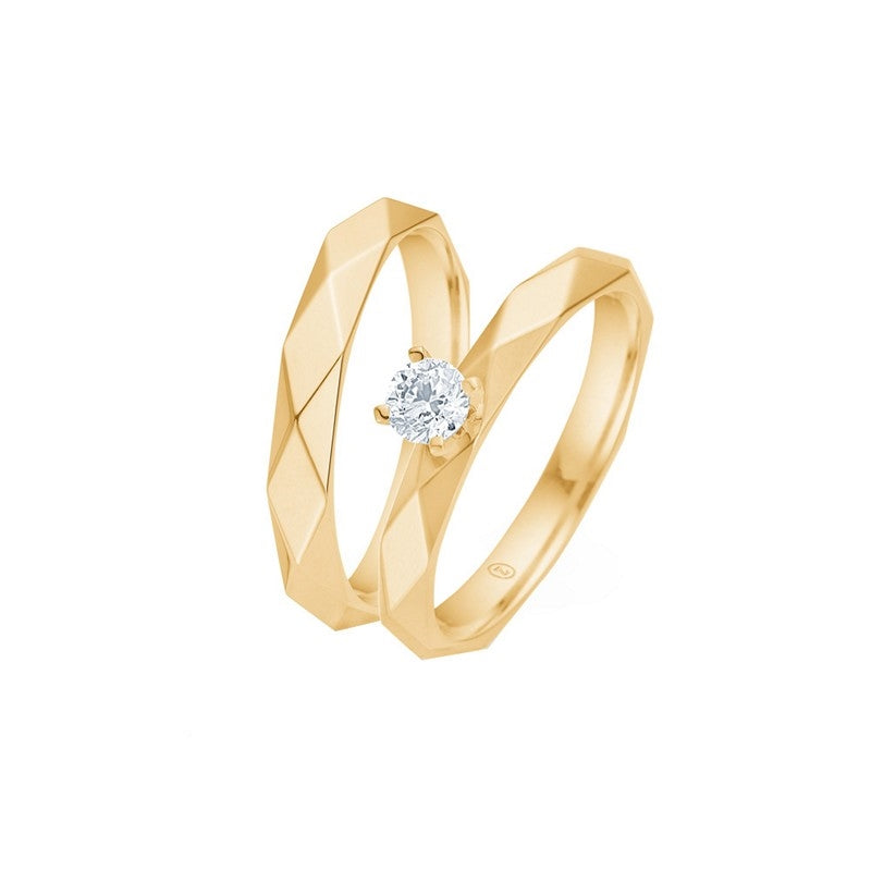 Eksklusiv Romeo og Julie vielsesringe fra Mads Z i 14 kt guld med harlekinternet og 0,20 ct diamant i dameringen.