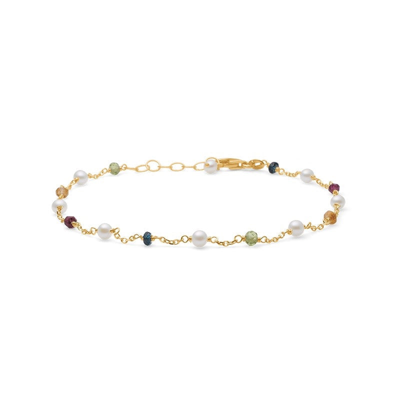 Mads Z blossom armbånd i 14 karat guld med peridot og hvide perler – elegant og feminint design.