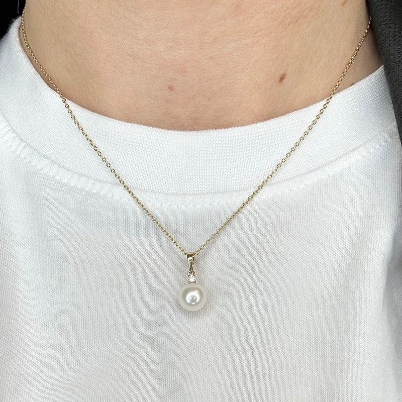 Siersbøl vedhæng i 14 kt guld med ferskvandsperle og 0,032 ct diamant