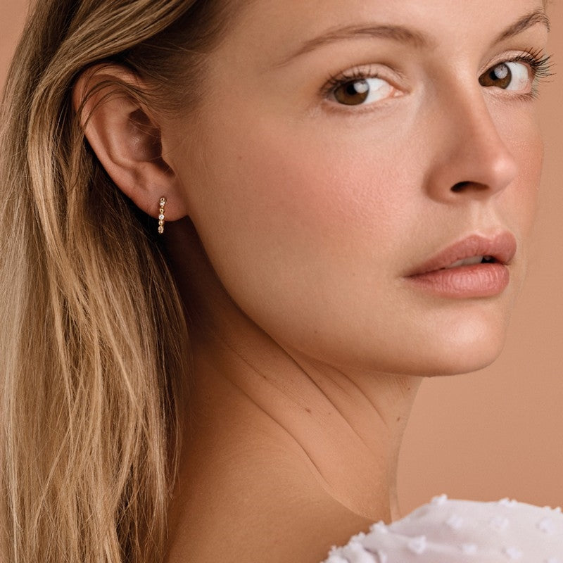 Melfia creoler i 14 karat guld med zirkonia