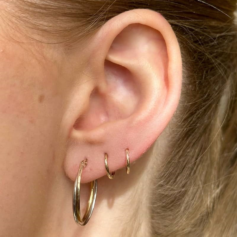 Siersbøl ovale creoler i bicolor 8 kt guld 23 x 14 mm