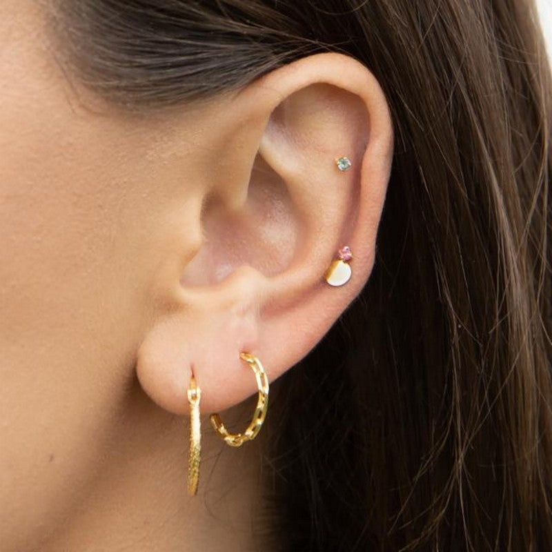 Labret-piercing i 14 kt guld med blå topas – Nordahl Andersen