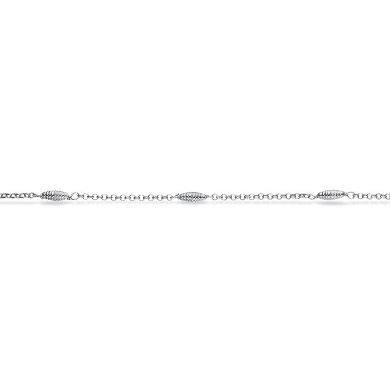 Scrouples ankelkæde med facetterede ovale led i rhodineret sølv 23–25 cm.