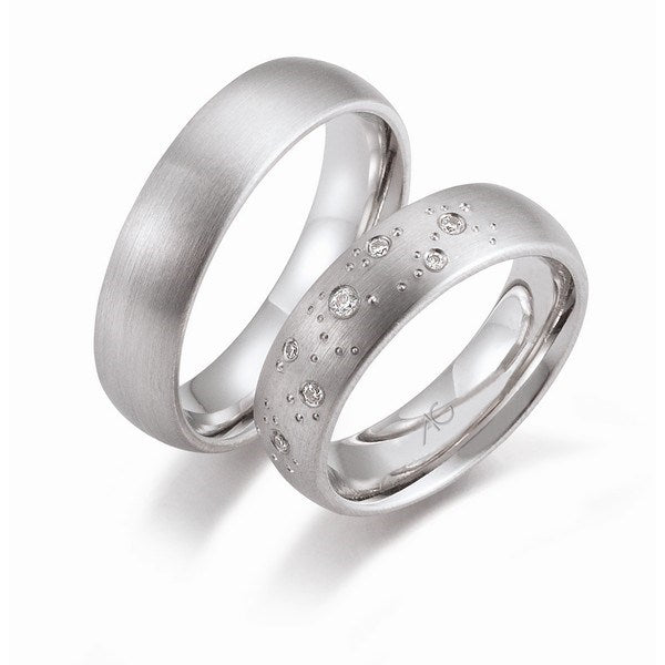 Eksklusive Gerstner vielsesringe i 14 eller 9 karat hvidguld med 7 x 0,01 ct diamanter