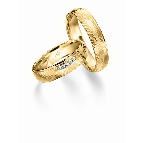 Eksklusive Gerstner vielsesringe i 14 eller 9 karat guld med 0,036 ct diamanter