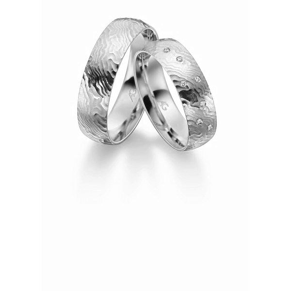 Unikke Gerstner vielsesringe i 9 eller 14 karat hvidguld med organisk overflade og 0,03 ct diamanter