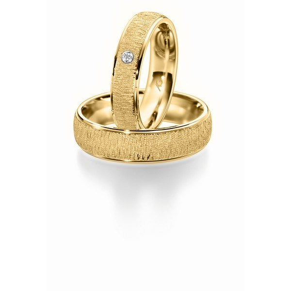 Romantiske Gerstner vielsesringe i 14 eller 9 karat guld med 0,03 ct diamant