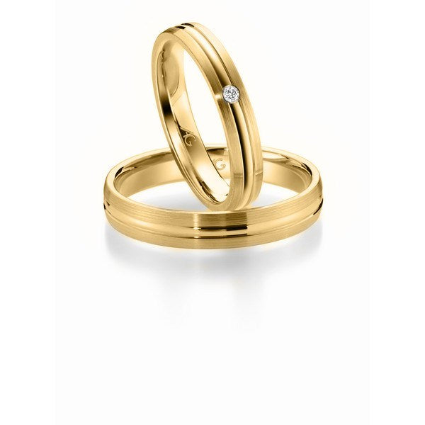 Gerstner vielsesringe i 14 eller 9 karat guld med 0,02 ct diamant