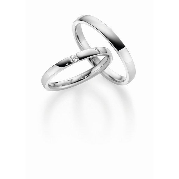 Gerstner vielsesringe i 9 eller 14 karat hvidguld med 0,04 ct diamant i blankt design – klassisk elegant sæt.