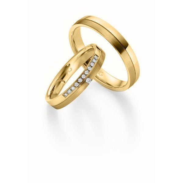 Unikt Gerstner vielsesringe-sæt i 14 karat guld med 0,07 ct diamanter – tofarvet overflade, klassisk design.