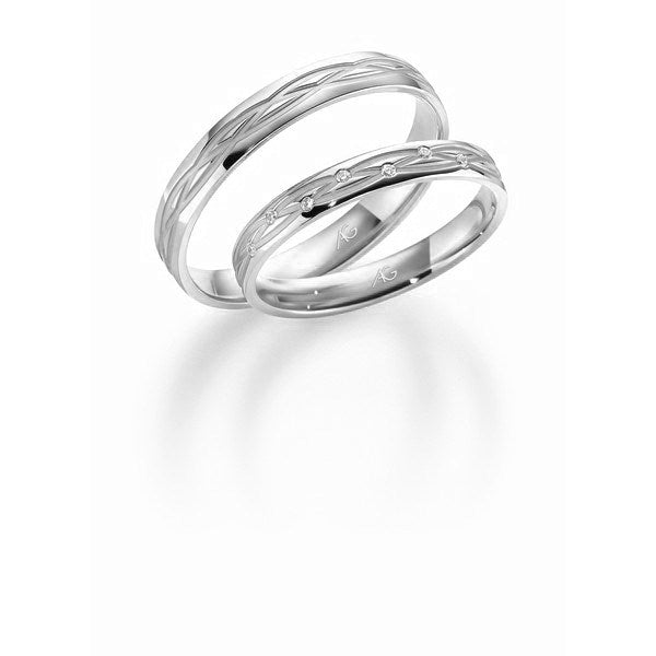 Unikke Gerstner vielsesringe i 9 eller 14 karat hvidguld med flettet silkemat mønster og 0,035 ct diamanter – sæt med damering og herrering.