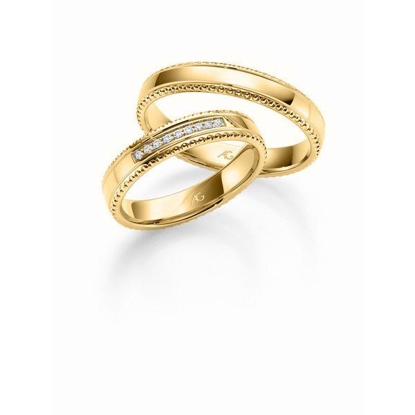 Romantisk Gerstner vielsesringe i 9 eller 14 karat guld med 0,045 ct diamanter og detaljeret mønster – 4 mm brede.