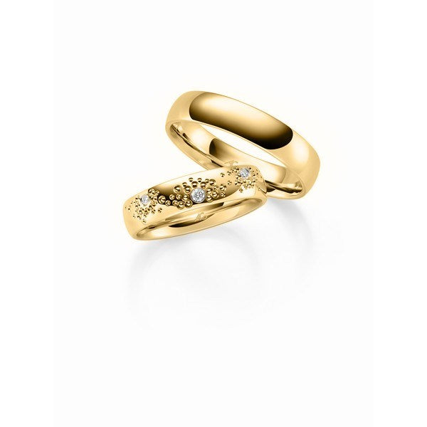 Stilfulde Gerstner vielsesringe i 9 eller 14 karat guld med mønster og 0,06 ct diamanter