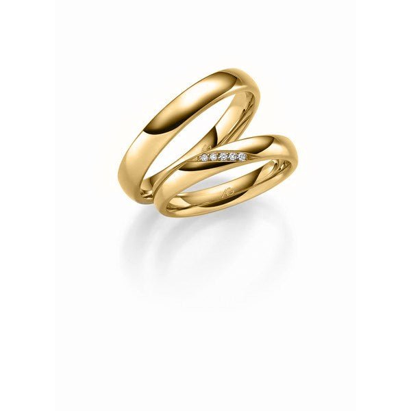 Unikke Gerstner vielsesringe i 14 karat guld med blank finish og 5 diamanter i damering.