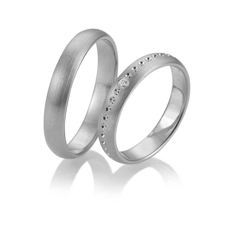 Tidløs Breuning vielsesringe i 9 eller 14 karat hvidguld med 0,025 ct diamant