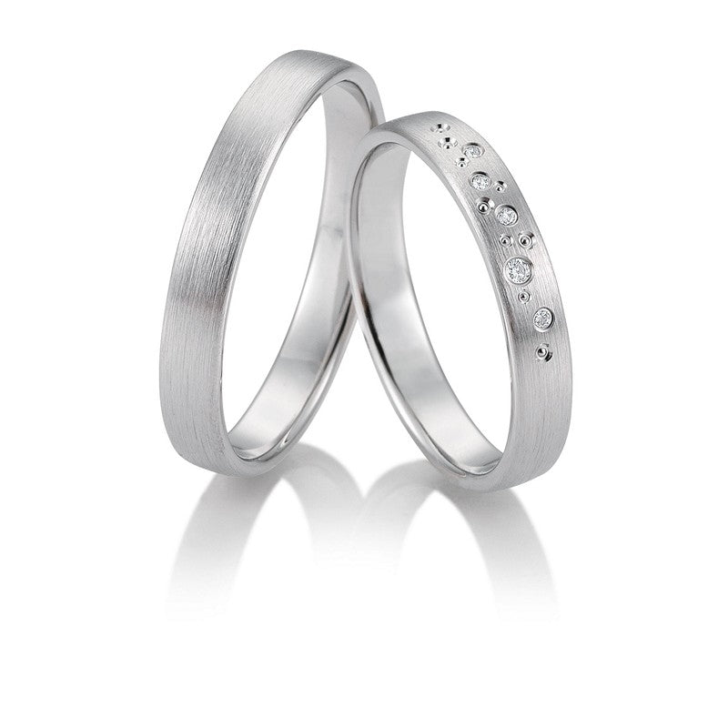 Raffineret Breuning vielsesringe i 9 eller 14 karat hvidguld med 0,032 ct diamanter