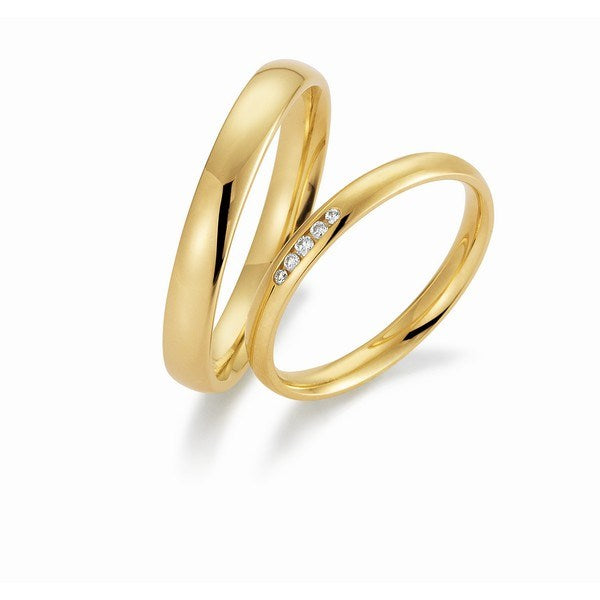 Gerstner unikke vielsesringe i 14 eller 9 karat guld med blank overflade og 0,036 ct diamanter i damering.