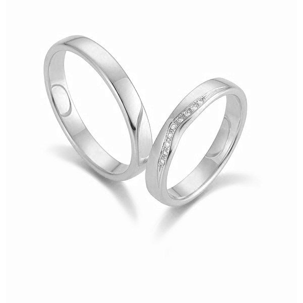 Eksklusive Gerstner vielsesringe i 14 eller 9 karat hvidguld med 0,045 ct diamanter i romantisk v-form – blank overflade, 3,5 mm brede.