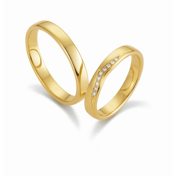 Klassiske Gerstner vielsesringe i 14 eller 9 karat guld med 0,045 ct diamanter og blank overflade.