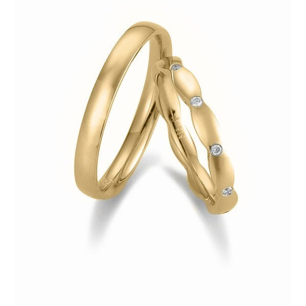 Fortryllende Gerstner vielsesringe i 14 eller 9 karat guld med 0,10 ct diamanter