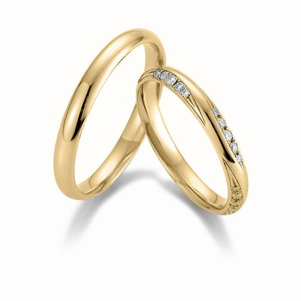 Romantiske Gerstner vielsesringe i 14 eller 9 karat guld med 0,27 ct diamanter