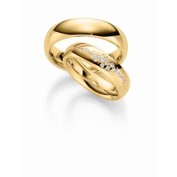 Romantisk Gerstner vielsesringe i 14 eller 9 karat guld med 0,106 ct diamanter – brede guldringe med diamantdetaljer.