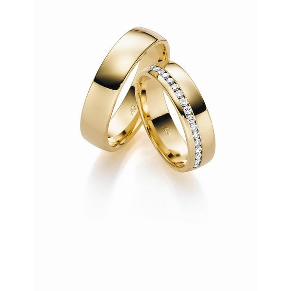 Eksklusive Gerstner vielsesringe i 9 eller 14 karat guld med 0,255 ct diamanter i klassisk design.