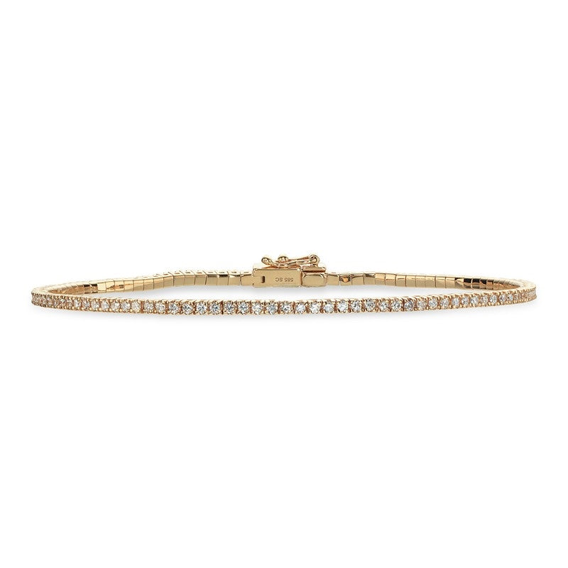 Dazzling tennisarmbånd fra Scrouples i 14 karat guld med 0,95 ct diamanter i H-W/SI kvalitet.