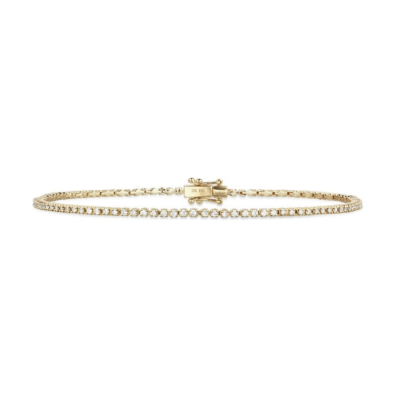 Scrouples dazzling tennisarmbånd i 14 karat guld med 0,55 ct H-W/SI diamanter – elegant smalt armbånd med brillantslebne diamanter.