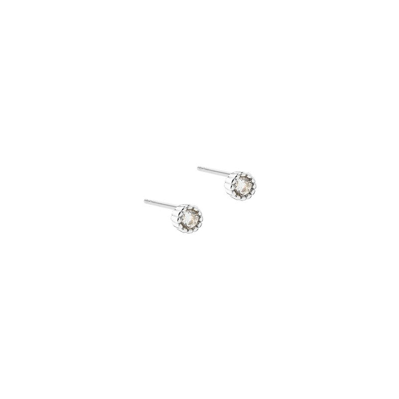 Aqua Dulce Lumi small ørestikker i 925 sterlingsølv med klar rund sten på 3,5 mm.