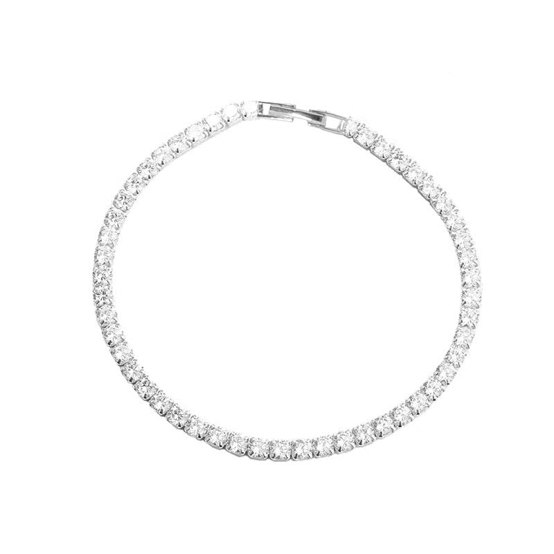 Aqua Dulce tennisarmbånd i sterlingsølv med klare zirkonia, 17 cm.
