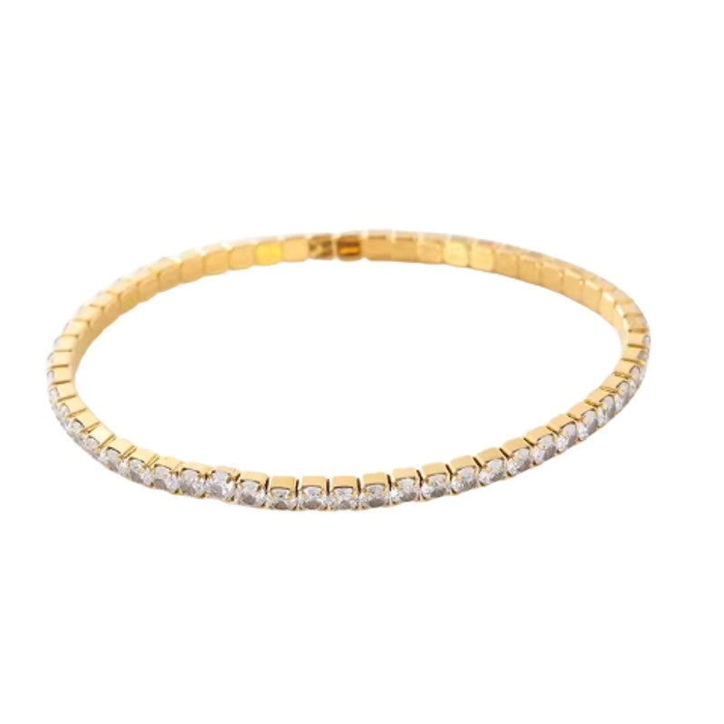 Aqua Dulce tennisarmbånd i 14 karat forgyldt sølv med zirkonia 19 cm – fleksibelt, gyldent armbånd med klare hvide sten.