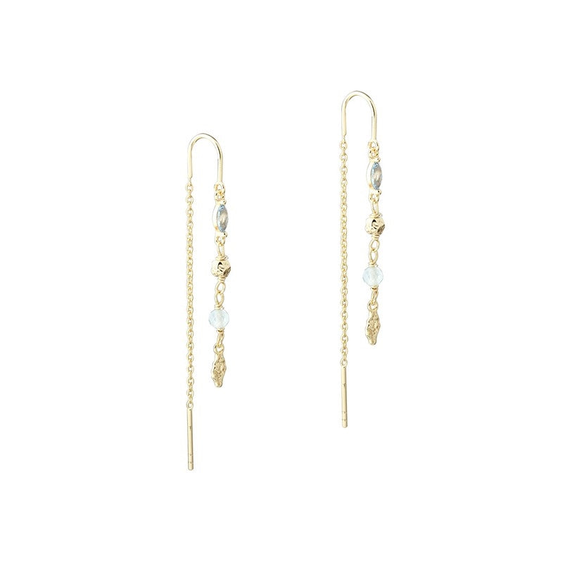 Aqua Dulce Sinna ørehængere i 925 sterlingsølv med 14 karat forgyldning, blå aquamarin og zirkonia – lange og elegante.