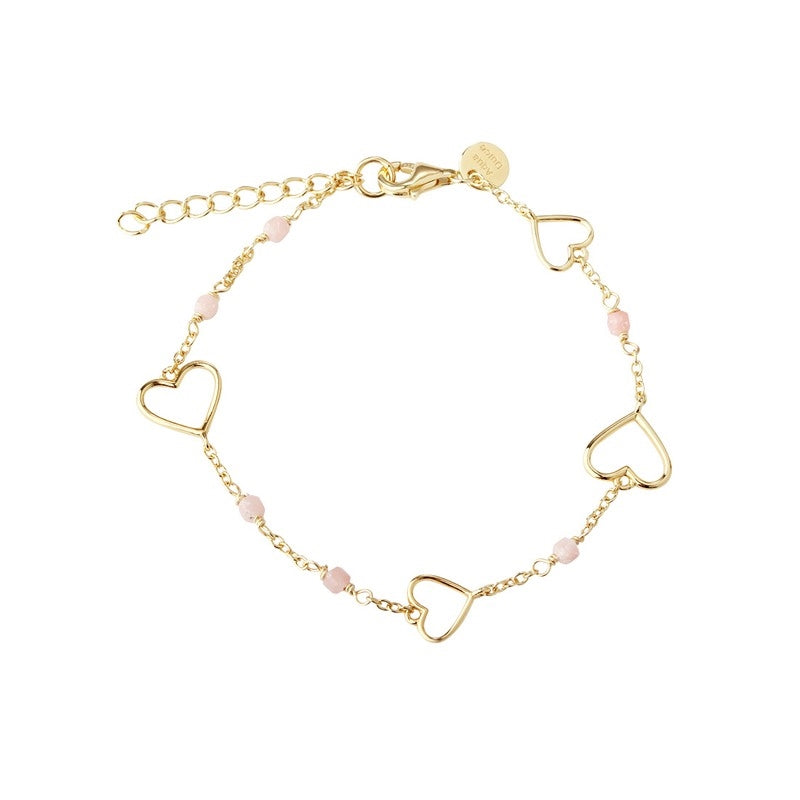 Alma armbånd i 925 sterlingsølv med 14 karat forgyldning fra Aqua Dulce – justerbart armbånd med åbne hjerter og lyserøde perler.