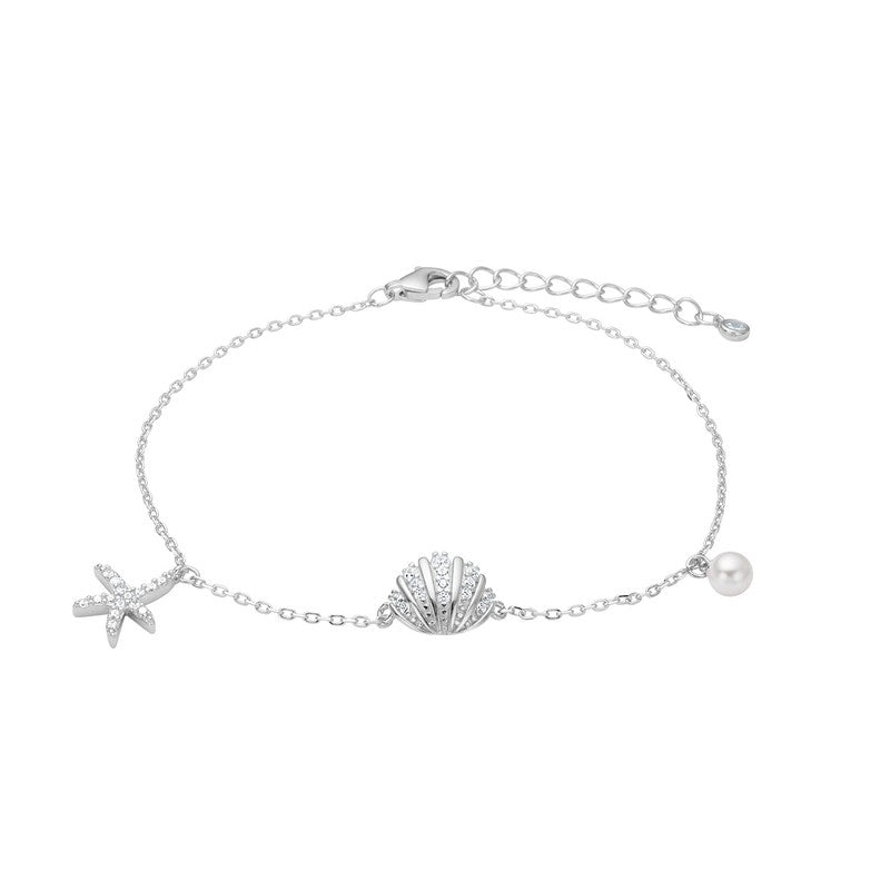 JoanliNor Selinanor armbånd i rhodineret 925 sterlingsølv med muslingeskal, zirkonia og perle 17–20 cm.