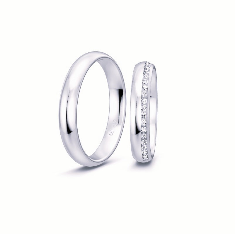 Breuning Renaissance vielsesring i 9 eller 14 karat hvidguld med 23 diamanter (0,23 ct) – elegant og tidløst design.