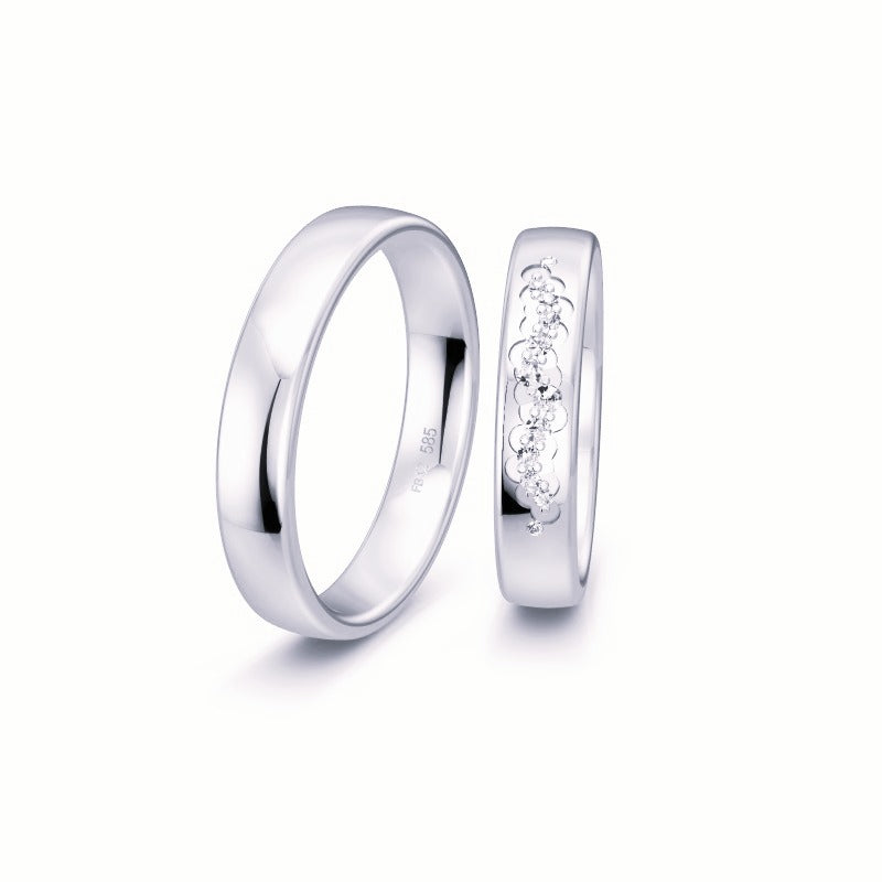 Breuning Renaissance vielsesring i 9 eller 14 karat hvidguld med 12 diamanter – klassisk og elegant ring med 4,5 mm bredde.