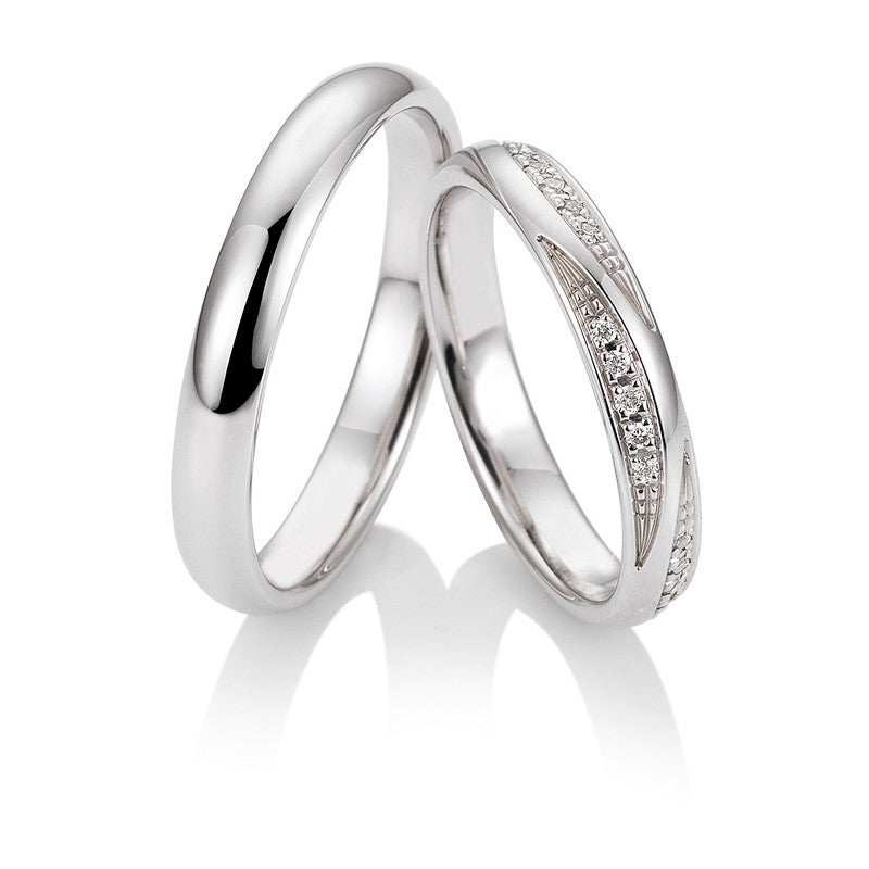 Breuning Renaissance vielsesring i 9 eller 14 karat hvidguld med 15 diamanter i slankt design.