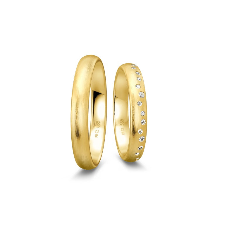 Breuning Renaissance vielsesring i 8 eller 14 karat guld med 19 diamanter og mat overflade.