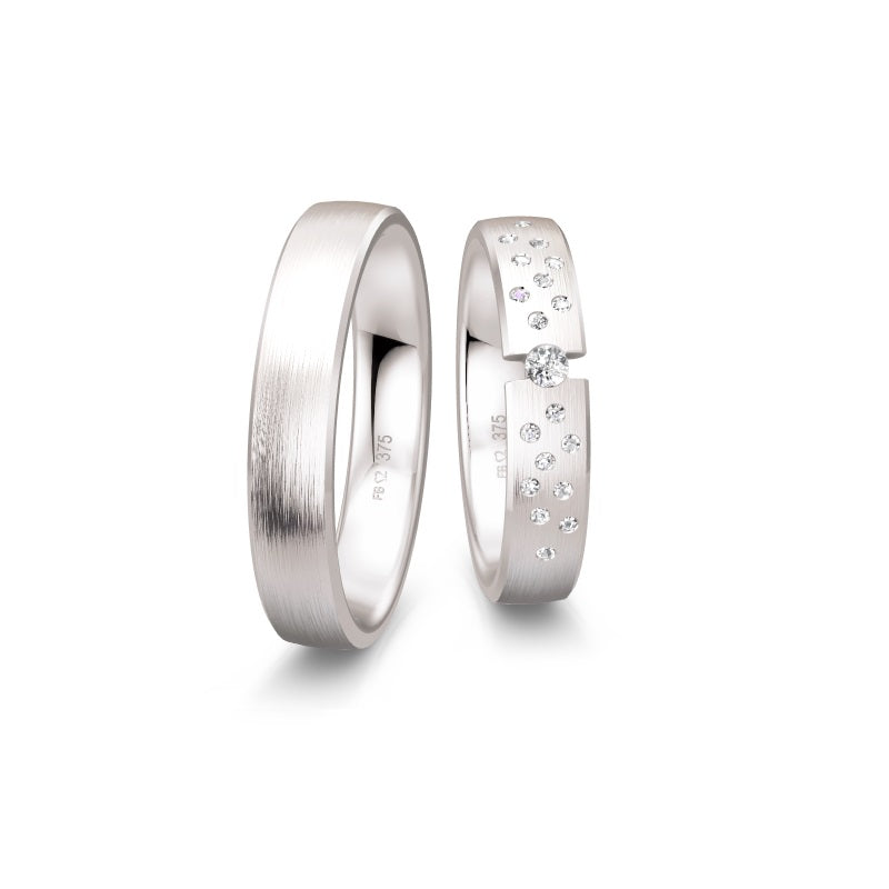 Breuning Renaissance vielsesring i 9 eller 14 karat hvidguld med 19 diamanter i moderne og tidløst design.