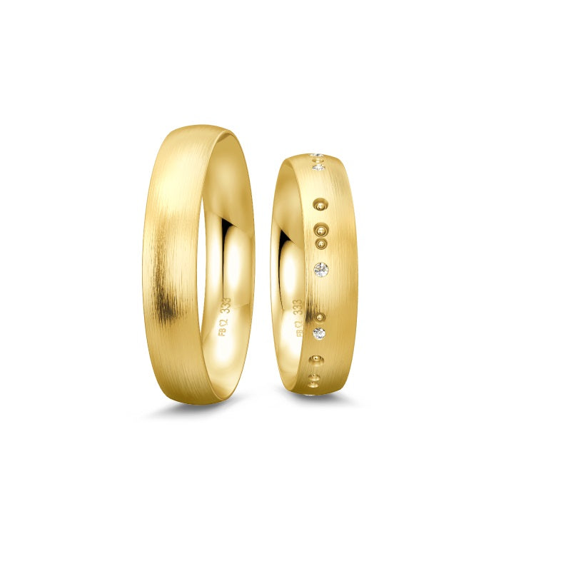 Breuning Renaissance vielsesring i 8- eller 14 karat guld med 9 diamanter (0,075 ct) og mat/guld finish.