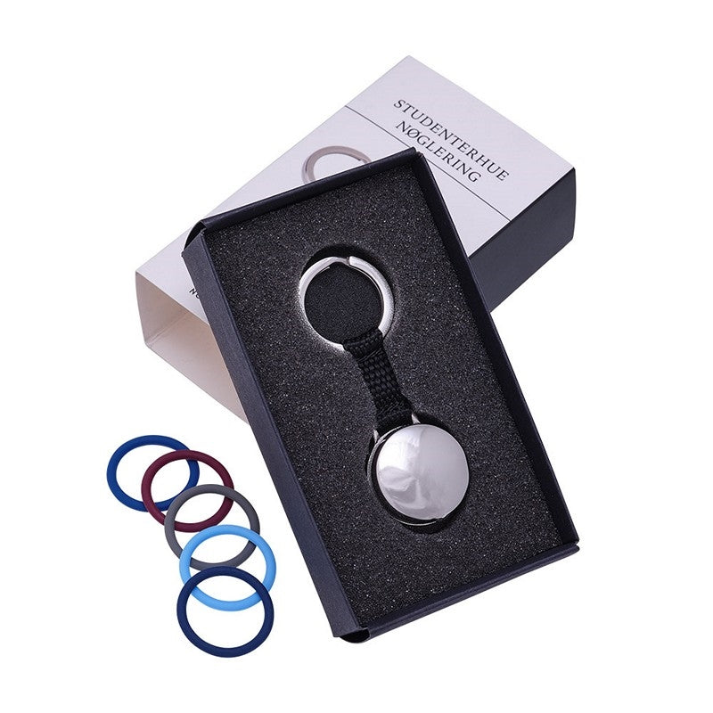 Studenterhue nøglering i stål fra Nordahl Andersen med mulighed for gravering