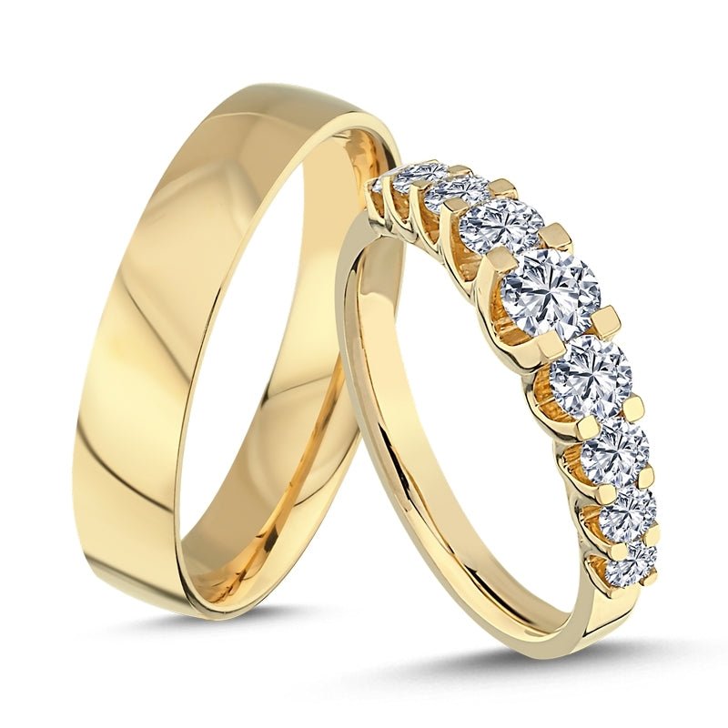 Særlige Nuran vielsesringe i 14 kt guld med 9 diamanter i Empire-design og herre-ring med buet profil.