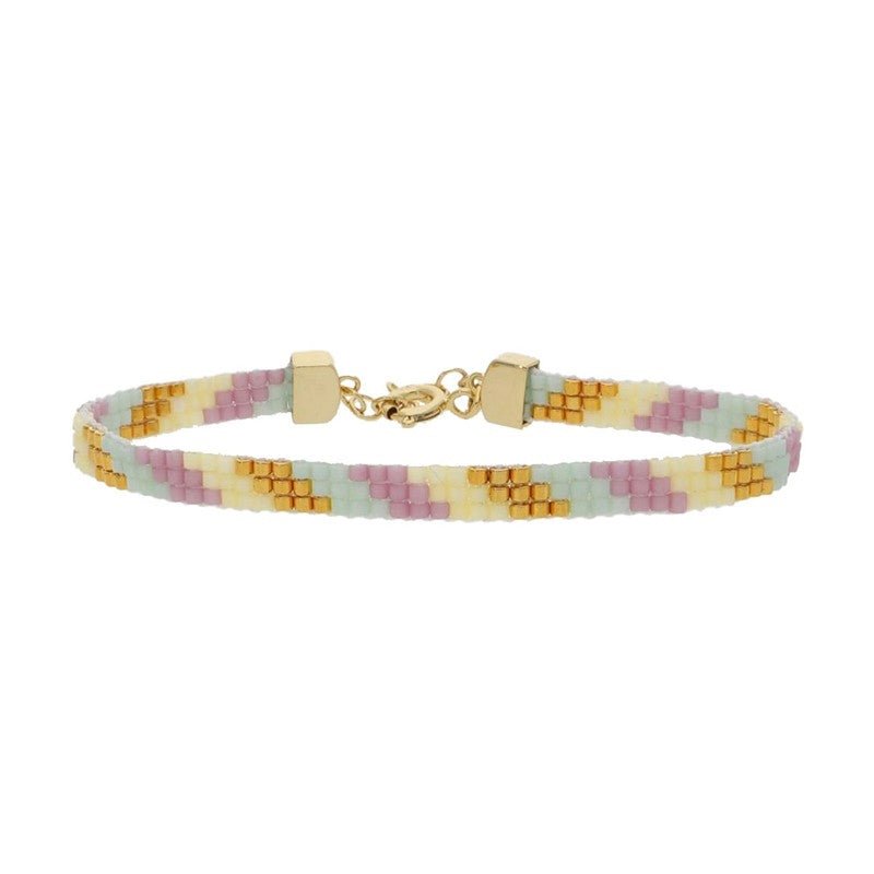 Lisa armbånd i forgyldt sølv 16–19 cm fra Nuni Copenhagen med perler i creme, lavendel, mint og guld.