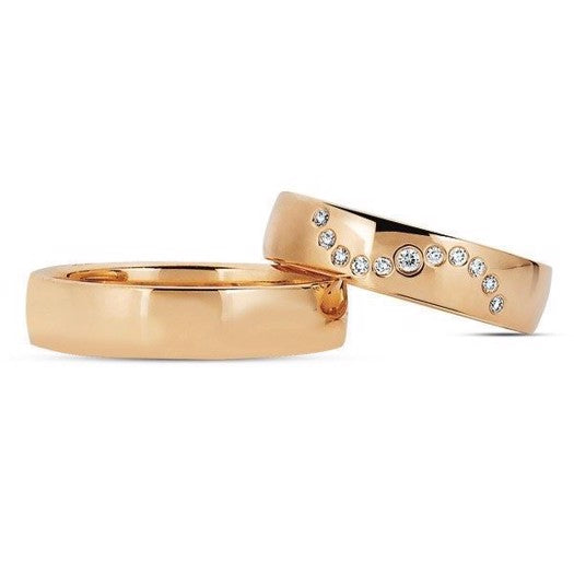 Smukke Nuran vielsesringe i 14 kt rosa guld med 11 diamanter på i alt 0,12 ct