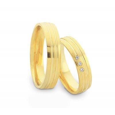 Eksklusive Nuran vielsesringe i 8 eller 14 karat guld med 0,03 ct diamanter